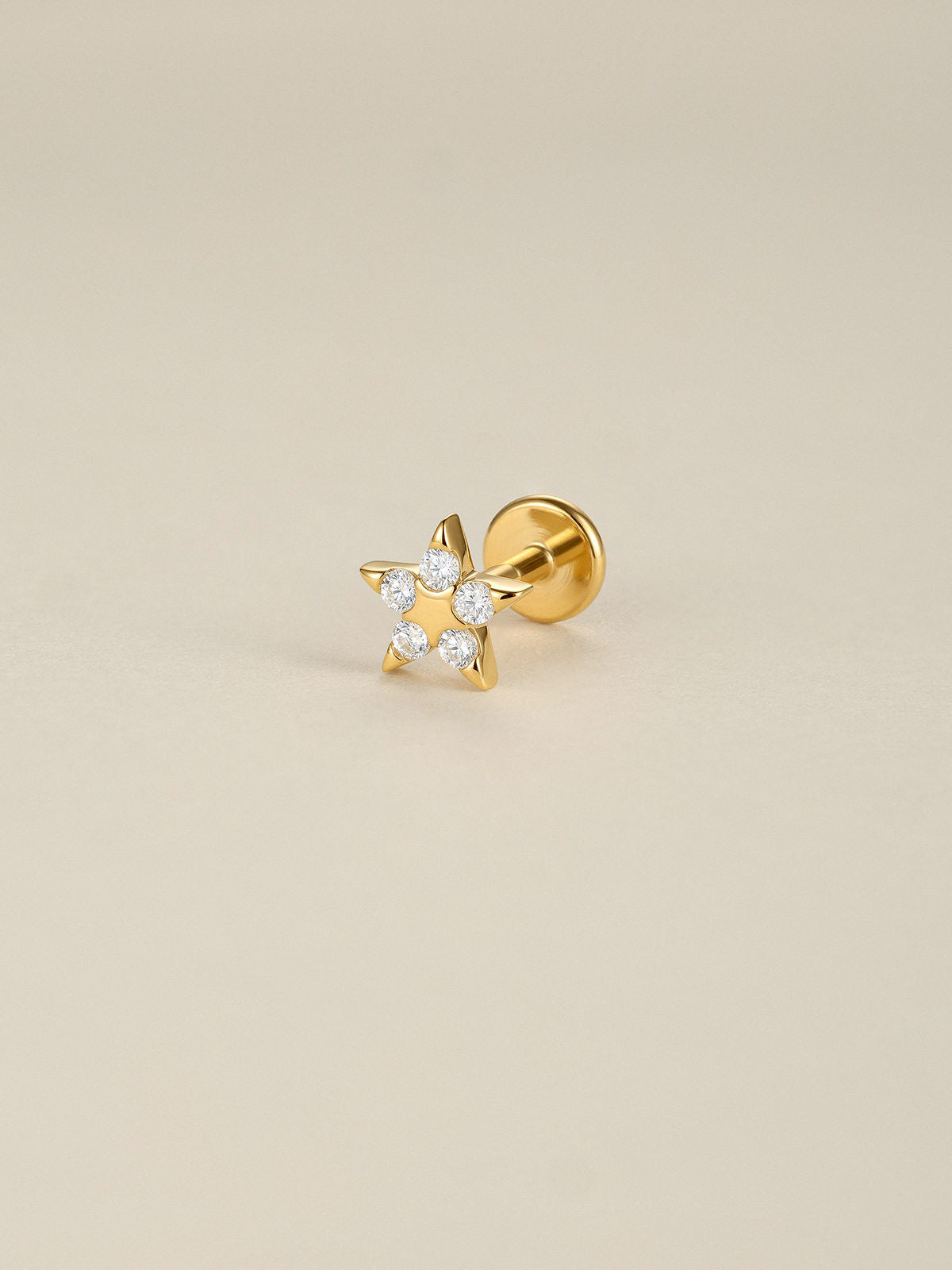 KOSINER Rising Star gold-plated 925 sterling silver star flat back stud with five clear stones and a round backing