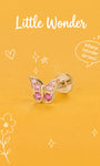Little Wonder 14K solid gold butterfly flat back stud on an orange background