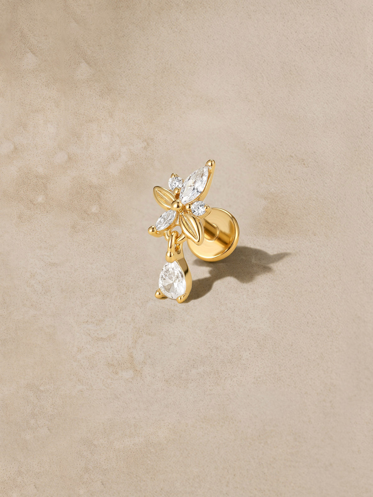 At Dawn olive branch flat back stud with sparkling pear-shaped drop