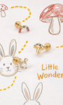 KOSINER Little Wonder gold mushroom, rainbow and bunny flat back studs with hand-drawn mushroom and bunny illustrations