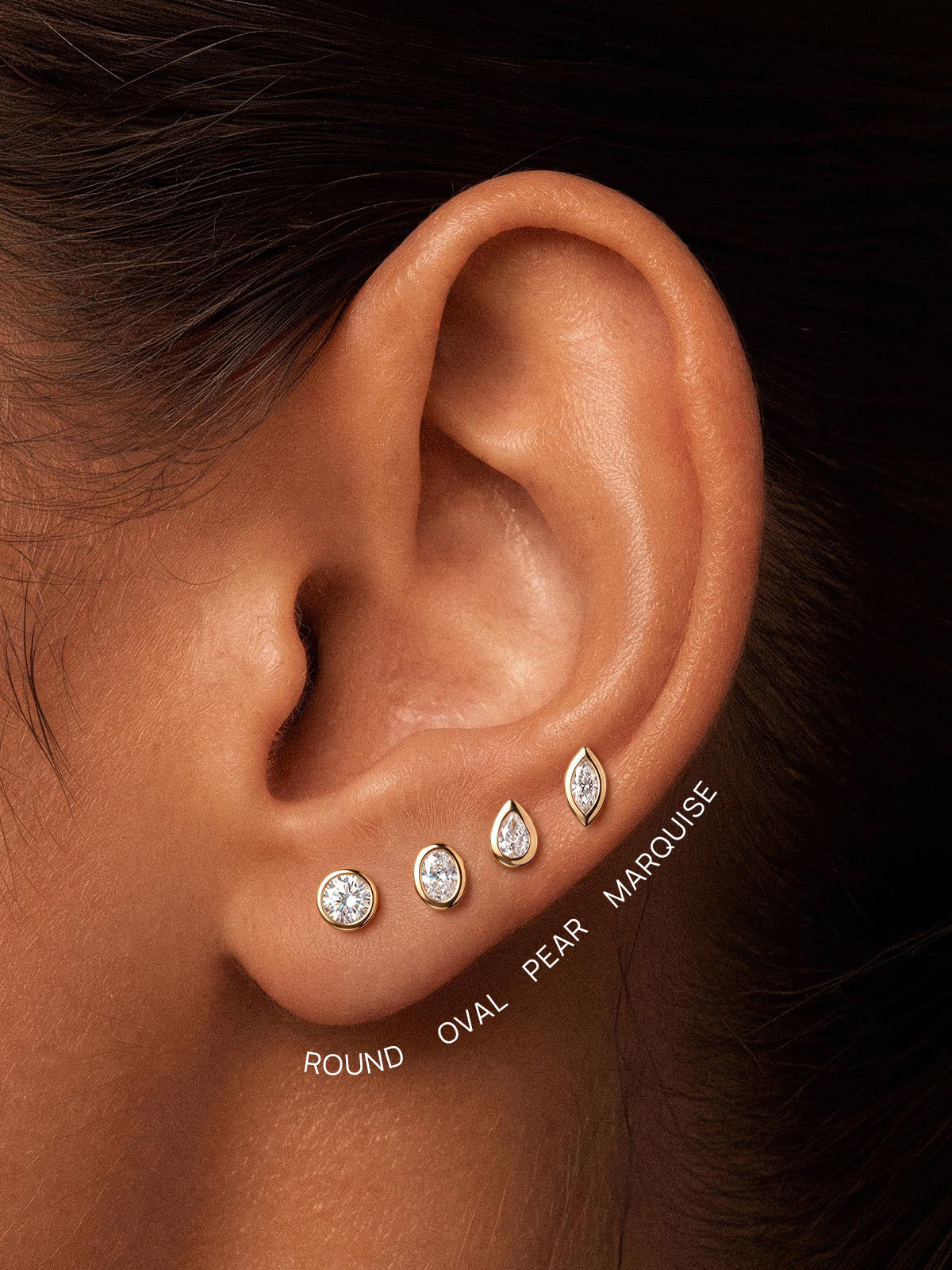 KOSINER bezel-set lab-grown diamond flat back studs in round, oval, pear and marquise shapes