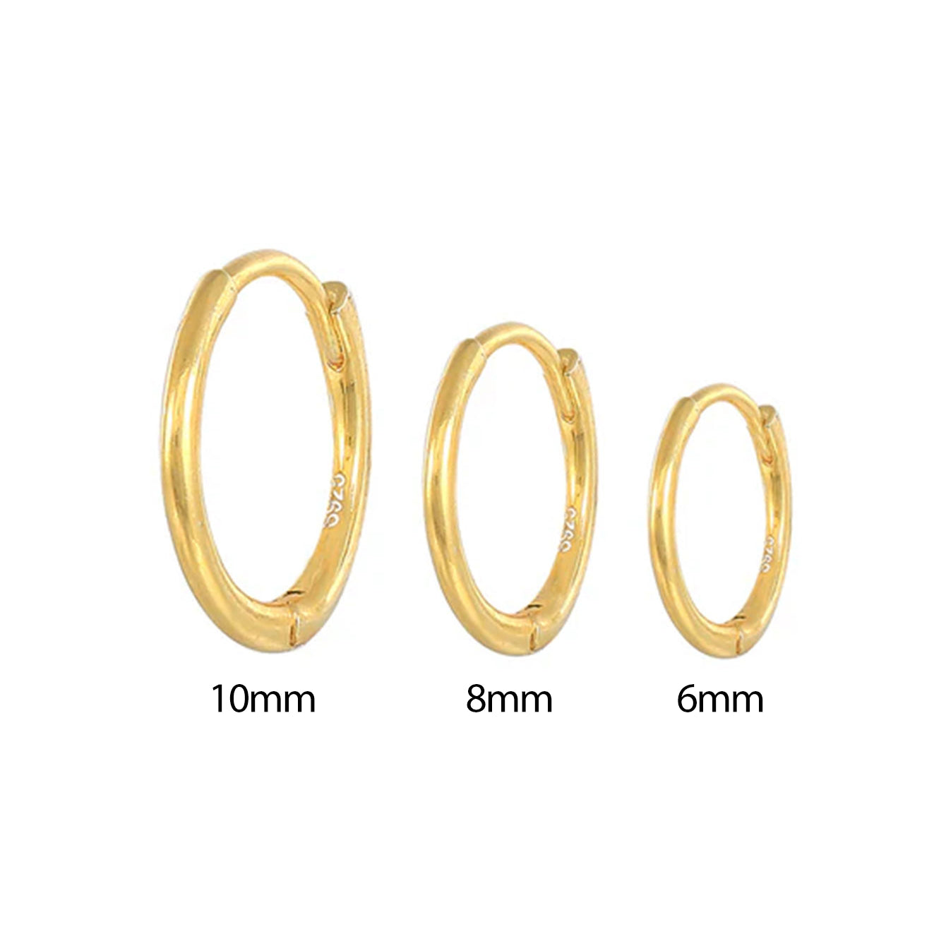 Set of three 18K gold plated sterling silver huggie hoop earrings in 10mm, 8mm, and 6mm sizes.