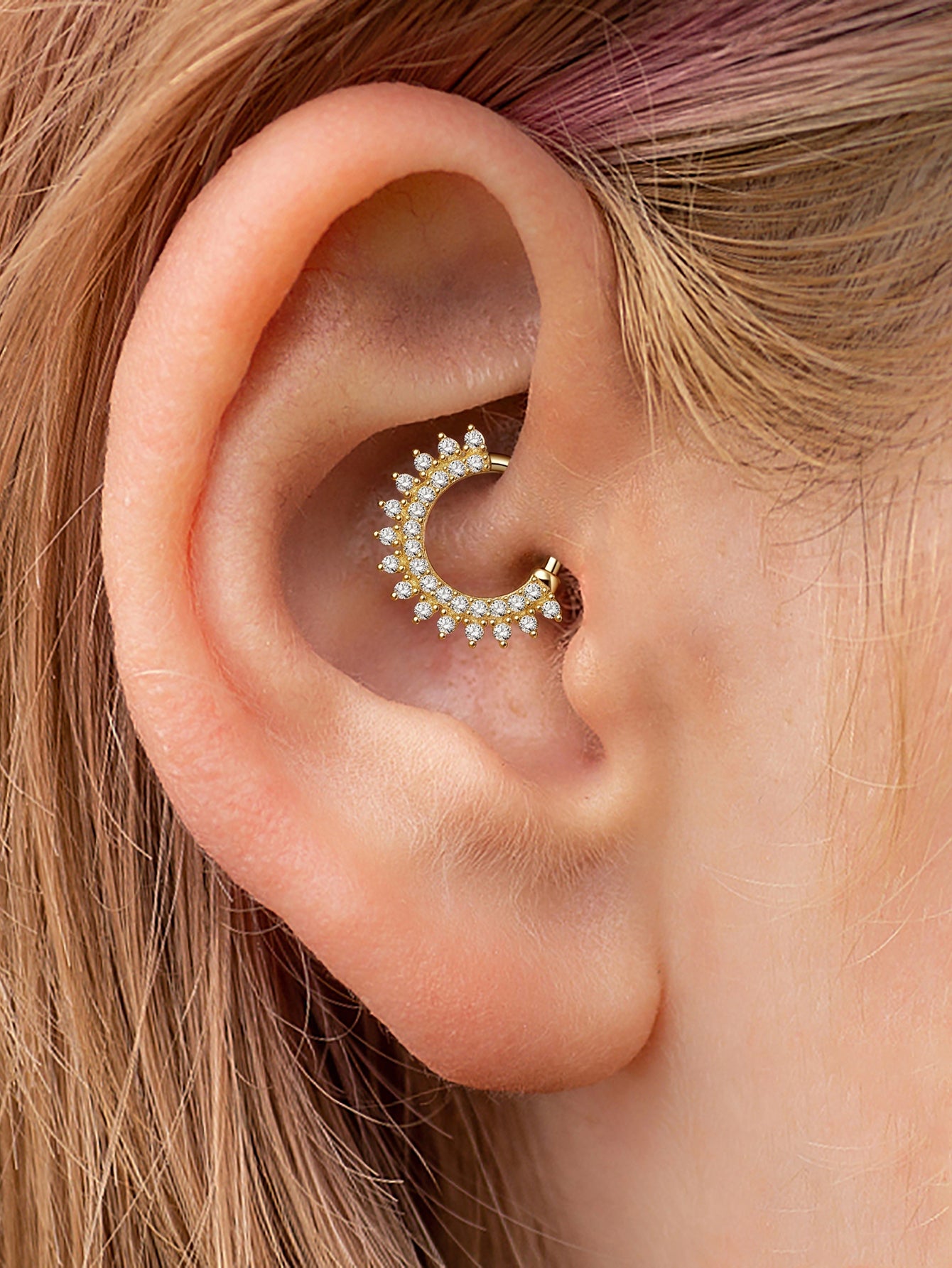 18K gold plated sterling silver daith piercing jewelry with double row of cubic zirconia stones on ear.