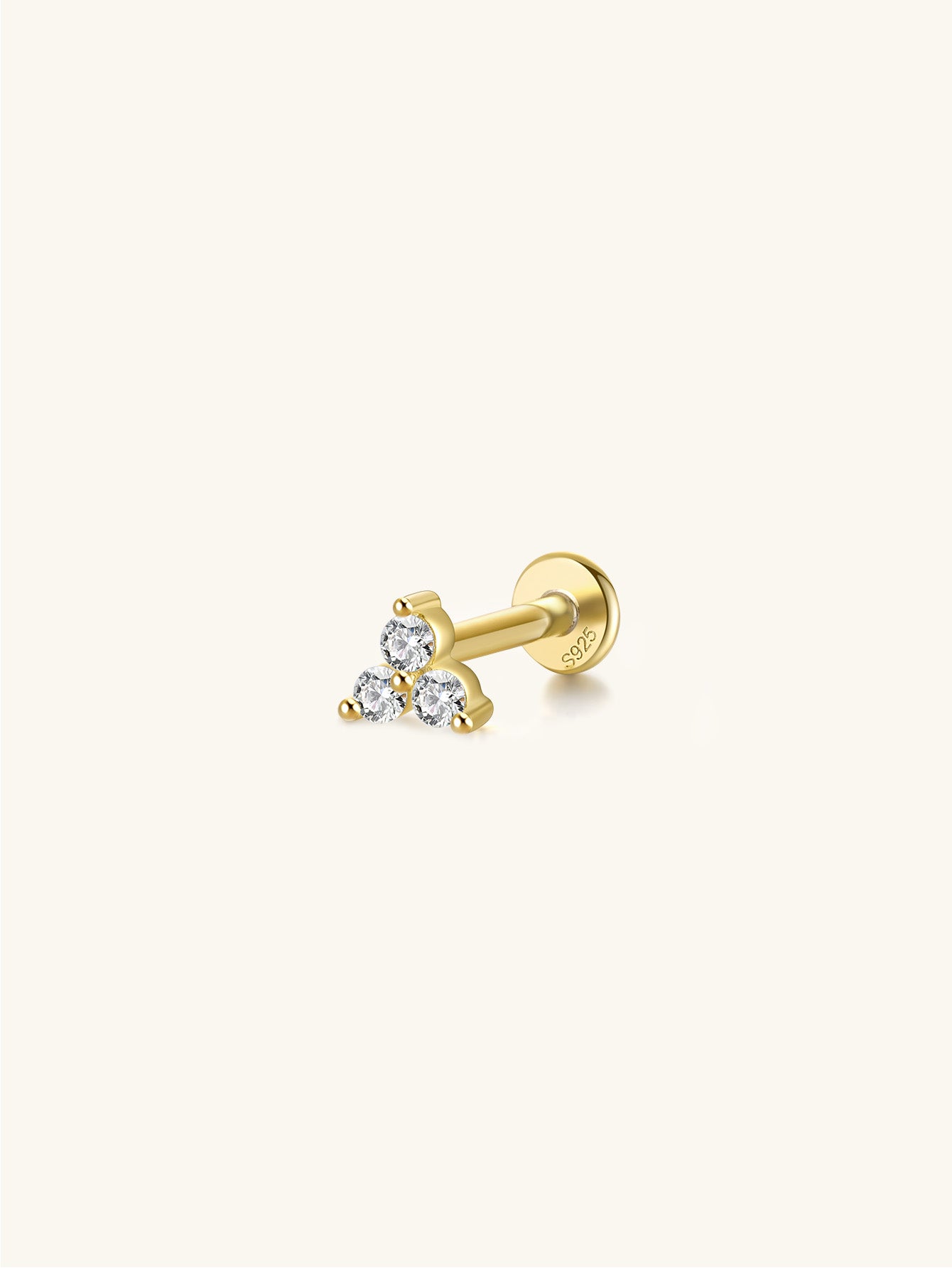 18kt gold-plated sterling silver labret stud with three sparkling cubic zirconia stones in a triangle design.