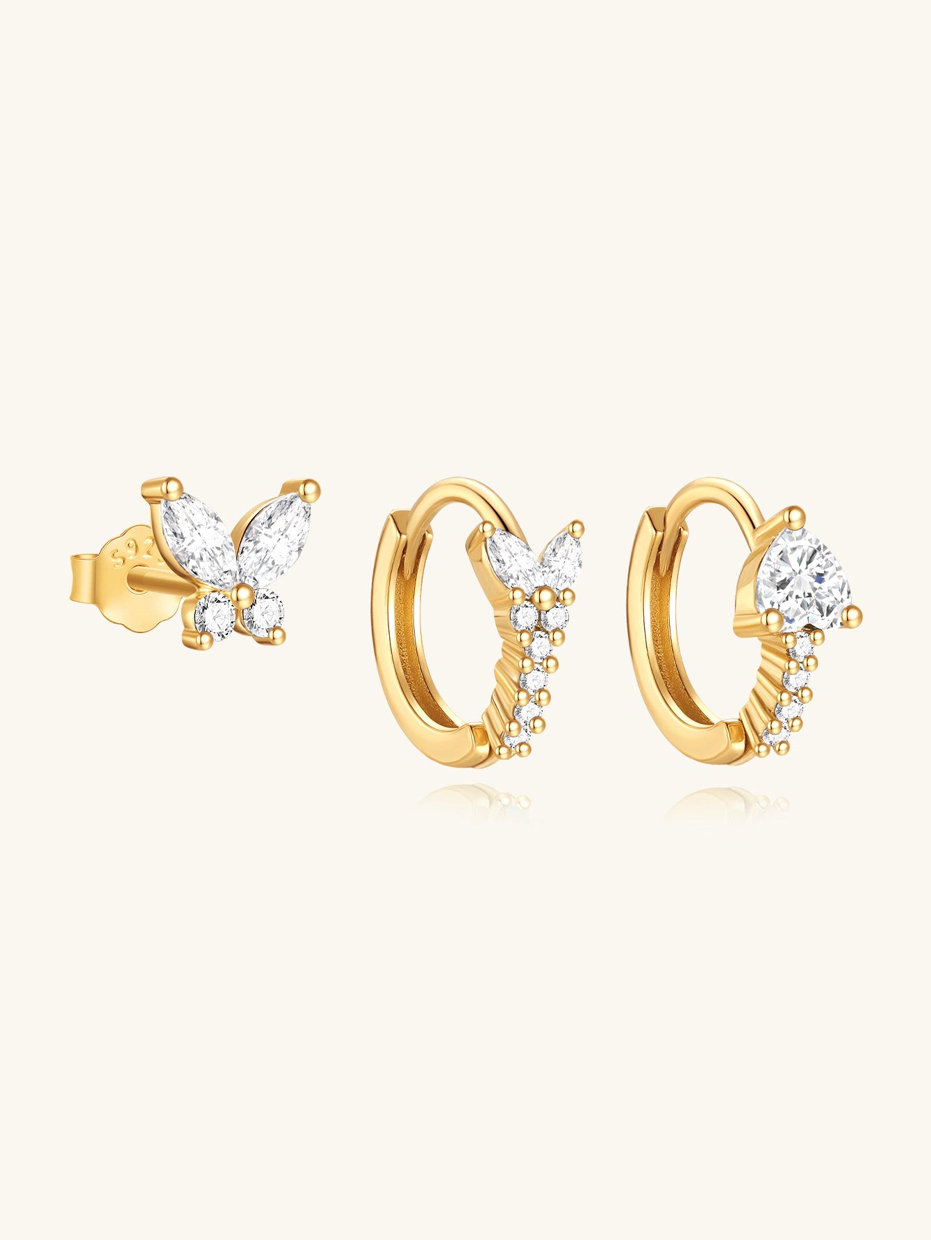 Gold-plated sterling silver earring set with butterfly and flower designs, encrusted with sparkling cubic zirconia stones.