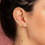 Gold plated sterling silver earrings: clover studs, cascading chains with CZs, moon accent.