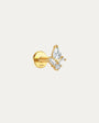 18k gold plated sterling silver labret stud with crown design and pear, baguette, and round cubic zirconias.