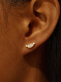 18k gold plated sterling silver cartilage earring with horse eye and water drop cubic zirconia stones on ear.