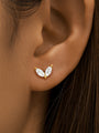 18kt gold plated sterling silver ear piercing stud with two marquise CZ stones, worn on ear.