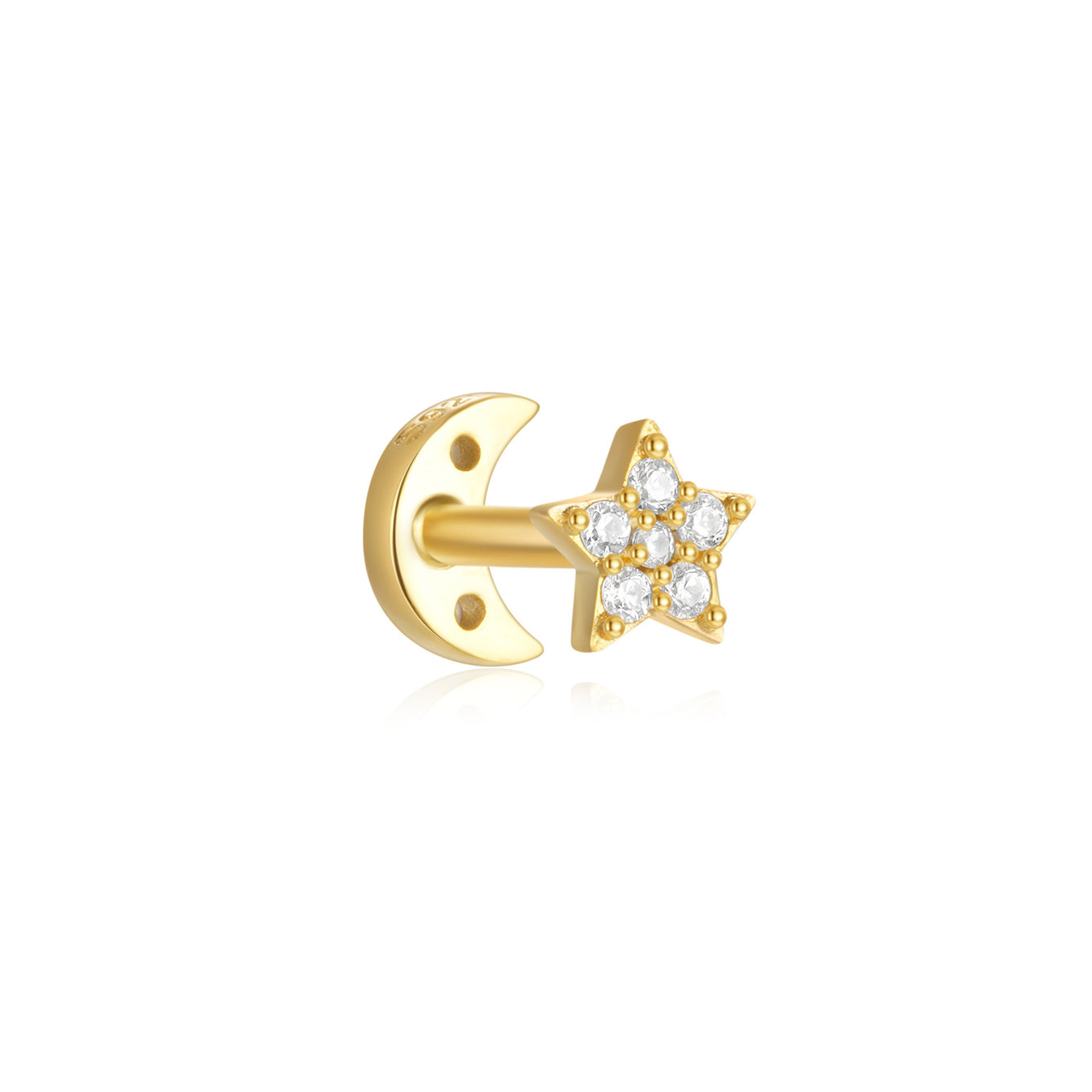 Gold plated sterling silver reversible star and moon piercing earring with cubic zirconia.