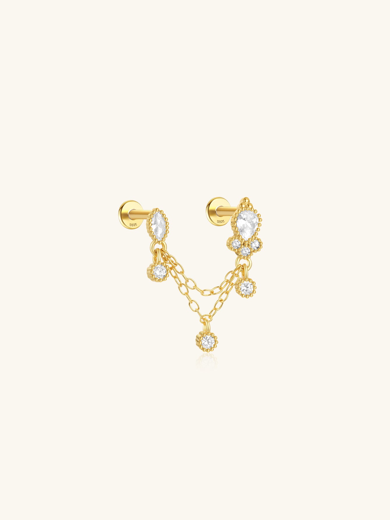 18kt gold-plated sterling silver double hole piercing stud with cubic zirconia and chain tassel.
