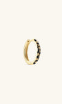Side profile shot of KOSINER Puzzle 925 sterling silver leopard print clicker hoop, hinged snap closure structure, smooth gold-toned band with irregular black enamel leopard spots, easy to wear minimalist everyday hoop earring