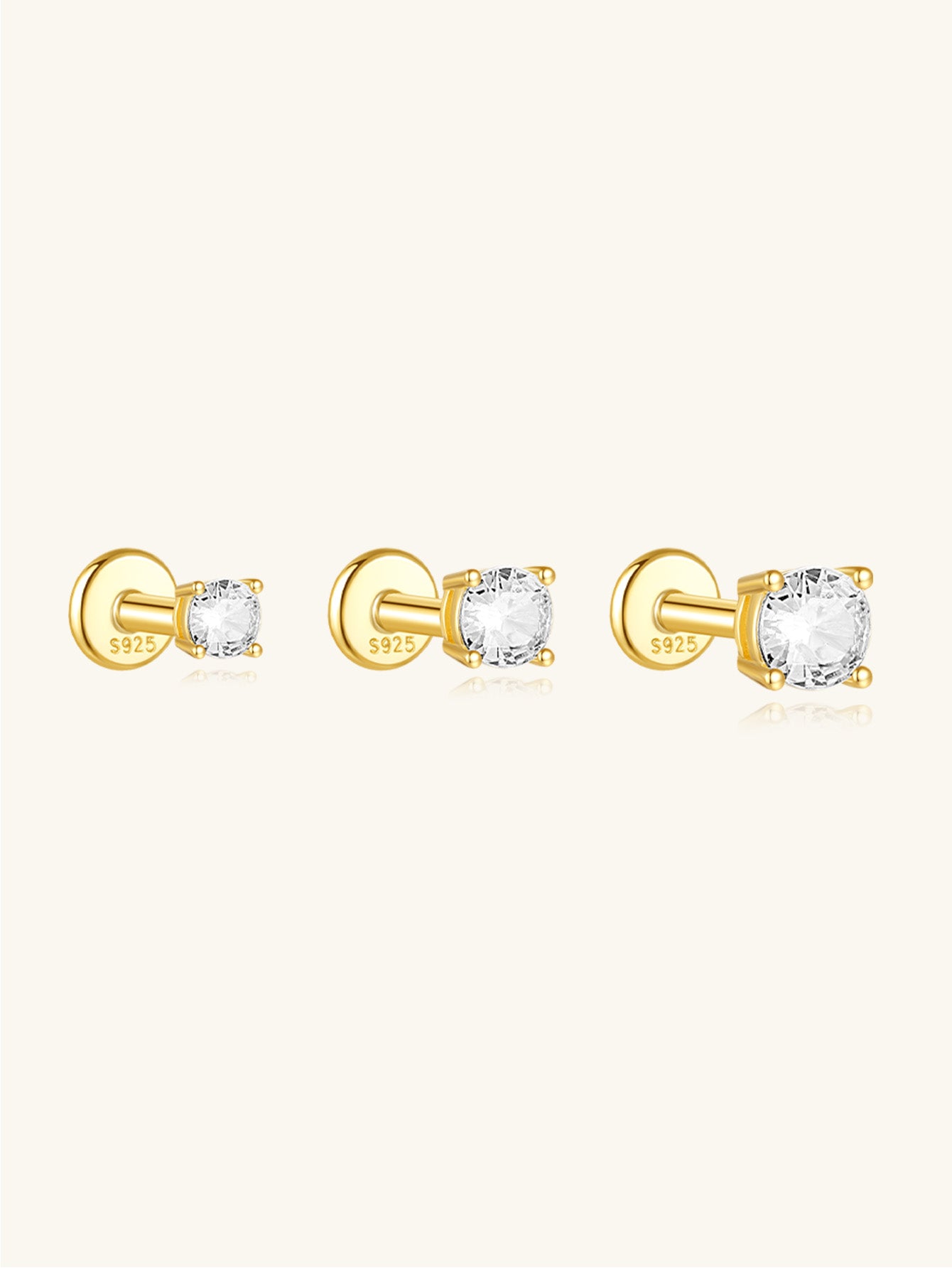 Three 18kt gold-plated sterling silver round cubic zirconia stud earrings in 2mm, 3mm, and 4mm sizes with flat backs.
