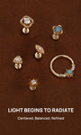 KOSINER Étoile radiance themed piercing jewelry collection laid on brown suede surface, showcasing marquise, square, triangular, starburst, turquoise floral flat back studs and matching decorative hoop, centered balanced refined luminous design lineup