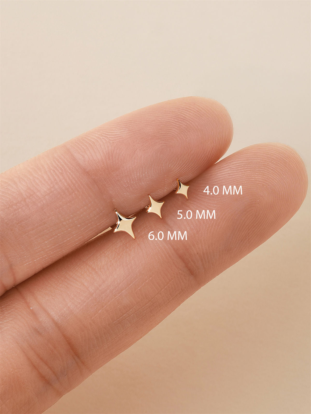 KOSINER 14K gold four-pointed star stud, minimalist design for curated ear stack layering