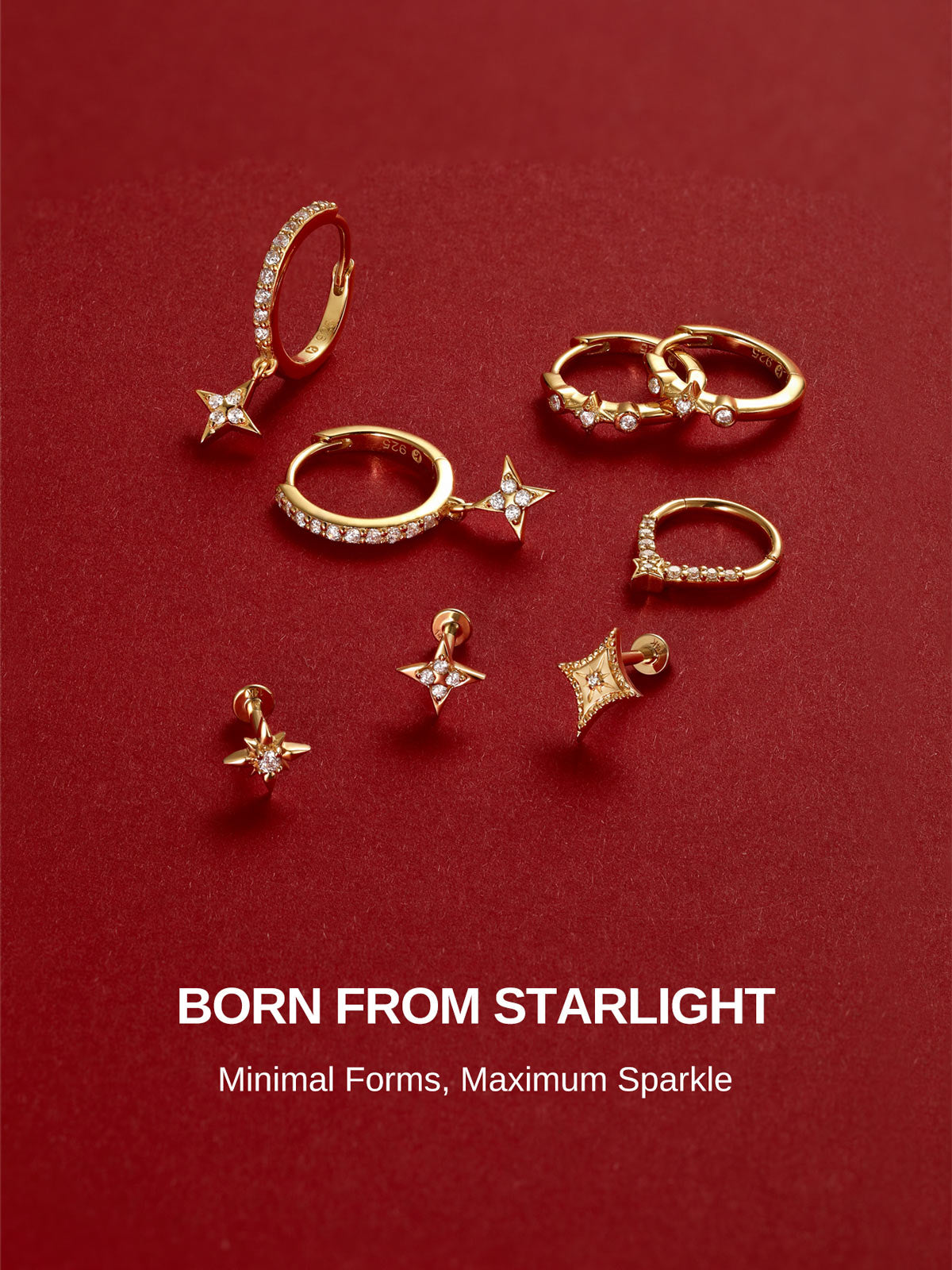 KOSINER Starlight full star jewelry collection arranged on deep red background, featuring assorted star hoop earrings, dangling star hoops and multiple styles of star flat back studs, headline text "BORN FROM STARLIGHT, Minimal Forms, Maximum Sparkle"