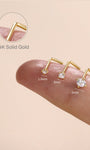 KOSINER L-shape nose studs in 1.5mm, 2mm, 3mm stone sizes laid across fingertip with dimension labels, inset close-up showing engraved 14K solid gold marking