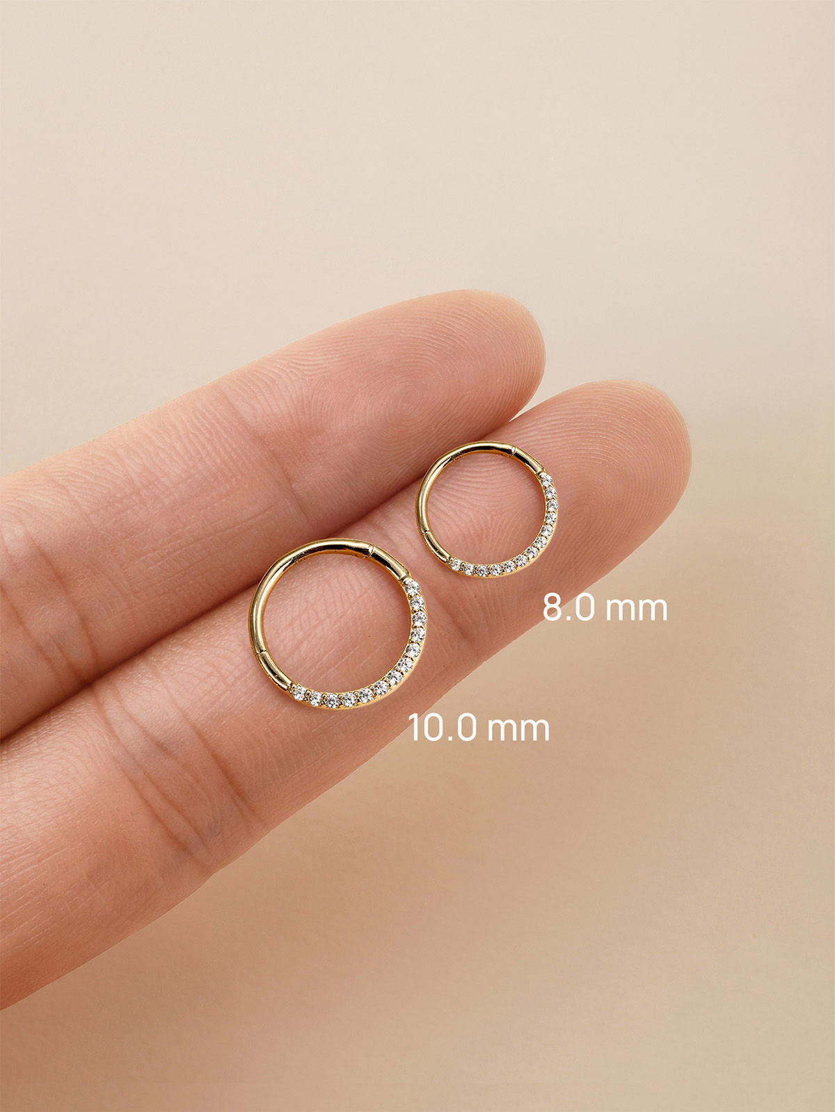 14K solid gold 18G hoop earring with pave cubic zirconia crystals, hinge closure.