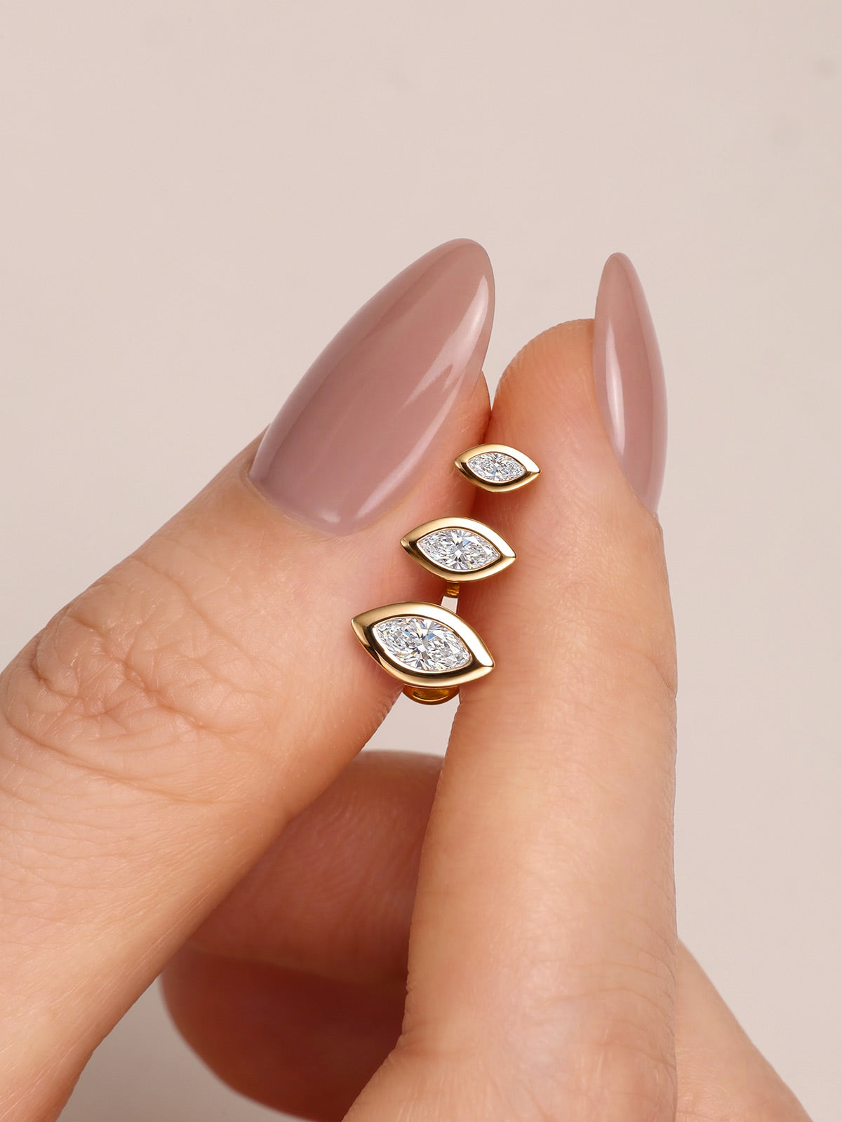 KOSINER marquise bezel lab-grown diamond flat back studs shown in three sizes