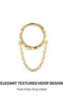 KOSINER Hand Hammered 14K Solid Gold Chain Pendant Hoop front view, round hinged hoop with organic dimpled hand hammered texture, dual side loops attached with delicate floating chain drop detail, polished 14K solid gold finish, wearable ear cuff for helix piercing
