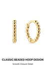 KOSINER Perléa Classic Beaded Hoop earring pair front view, continuous smooth polished spherical bead huggie hoop construction, gold-plated finish over premium 925 sterling silver base, sleek seamless hinged snap closure structure for easy insertion