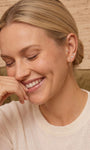 KOSINER elegant round opal flat back stud, with iridescent sheen, hypoallergenic and durable