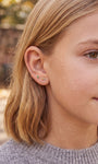Model wearing a 14K gold cactus stud with coordinating flat back earrings