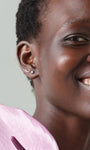 Curved five-stone cartilage stud, minimalist design for curated ear stack, 14K yellow gold