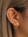 18kt gold-plated sterling silver ear piercings: triangle & flower studs with chains. Cubic zirconia.