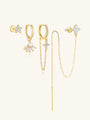 Four 18k gold plated sterling silver earrings with CZ and pearl: clover studs, dangle, and chain designs.