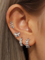 Silver 925 leaf stud earring with cubic zirconia, 16g cartilage jewelry with gold plating on ear.