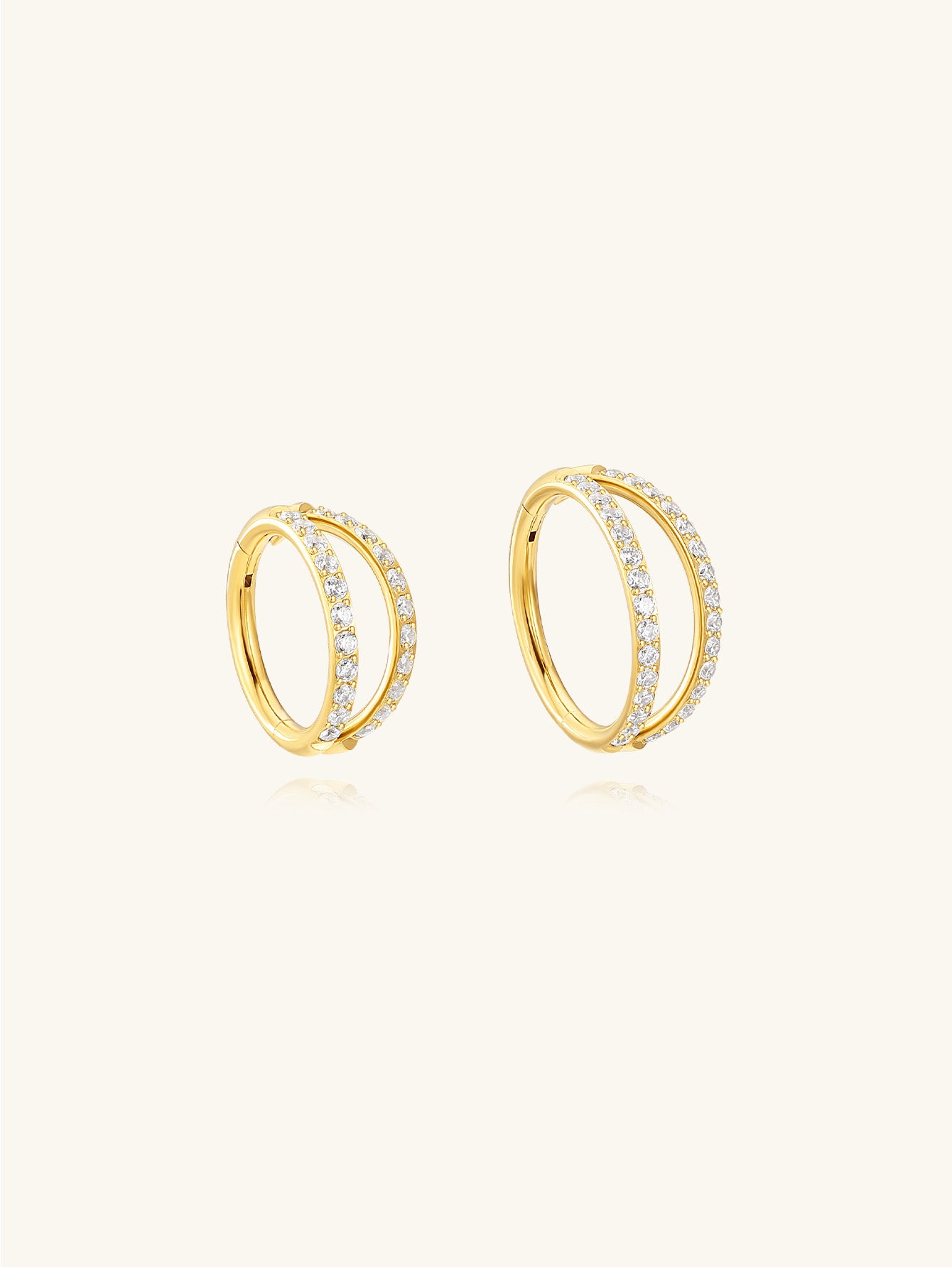 Gold titanium double hoop cartilage earrings with sparkling cubic zirconia, 16g.