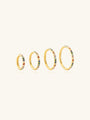 Four gold titanium cartilage hoop earrings with colorful cubic zirconia stones, showcasing different sizes from 6mm to 12mm.