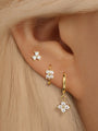 Gold plated sterling silver floral earrings collection: stud, hoop, and dangle styles with cubic zirconia.