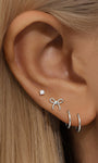 KOSINER elegant gold jewelry featuring a unique design, perfect for any occasion, showcasing sophisticated craftsmanship and timeless style.