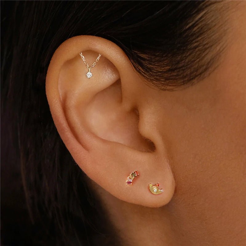 18kt gold plated sterling silver chain cartilage earring with cubic zirconia stud.