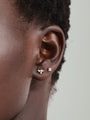 14K solid gold four flower ear piercing stud with cubic zirconia on ear.