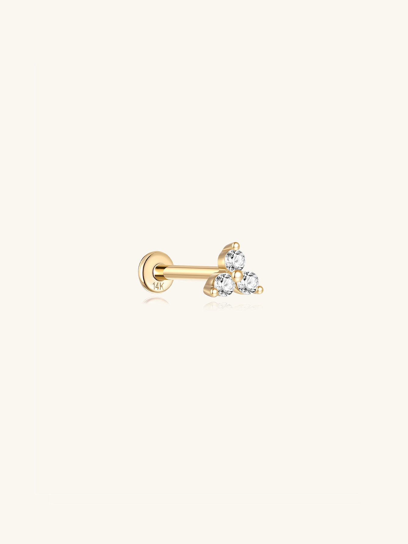14K solid gold trinity stud piercing with three cubic zirconia stones and flatback post.