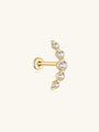 14K solid gold curved ear piercing stud with five cubic zirconia stones and a flat back closure.