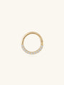 14K solid gold hoop earring with pave cubic zirconia crystals on a light background.