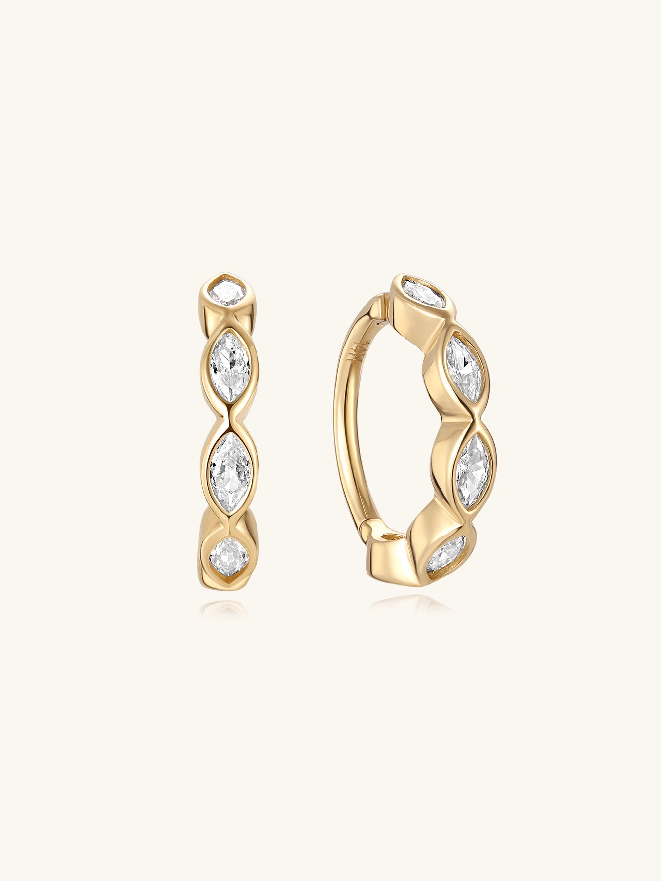 14K solid gold hinged segment hoop ring with four marquise-cut cubic zirconia crystals.