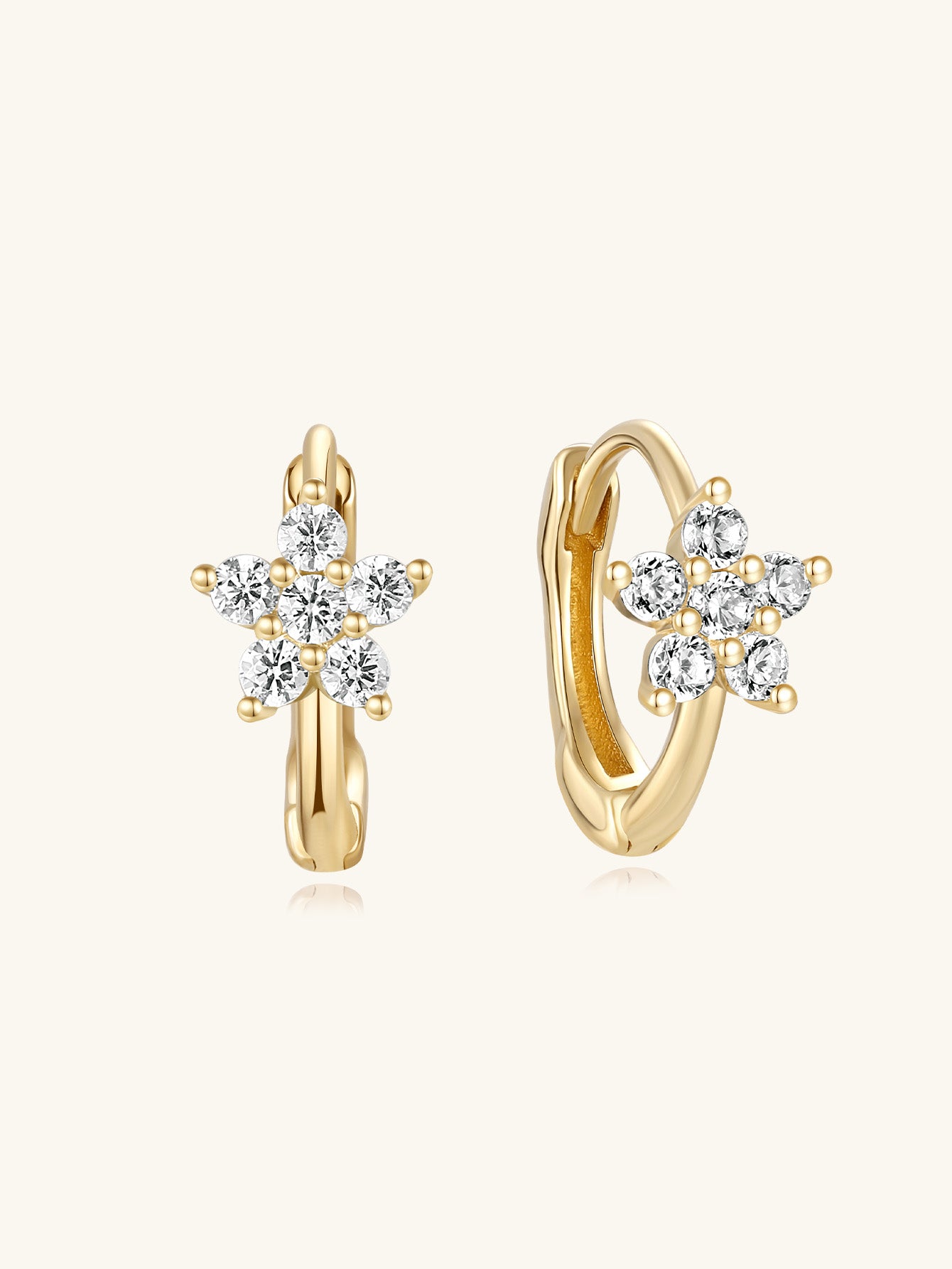 14K solid gold hoop earrings with flower-shaped cubic zirconia, 6mm inner diameter.