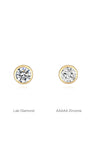 14K solid gold stud earrings comparing lab diamond and AAAAA cubic zirconia stones, internally threaded labret design.