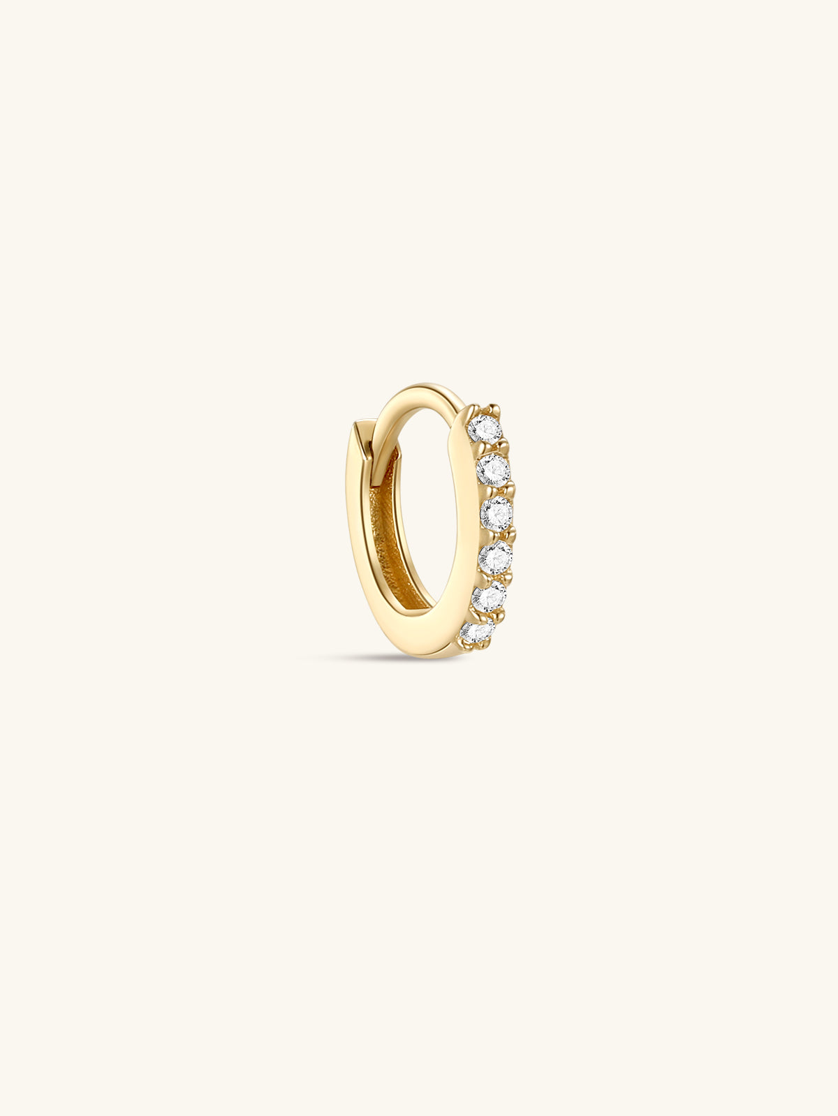 Single KOSINER minimalist pavé diamond clicker hoop in 14K solid yellow gold, seamless hinged closure, continuous row of sparkling faceted stones, clean minimalist product shot