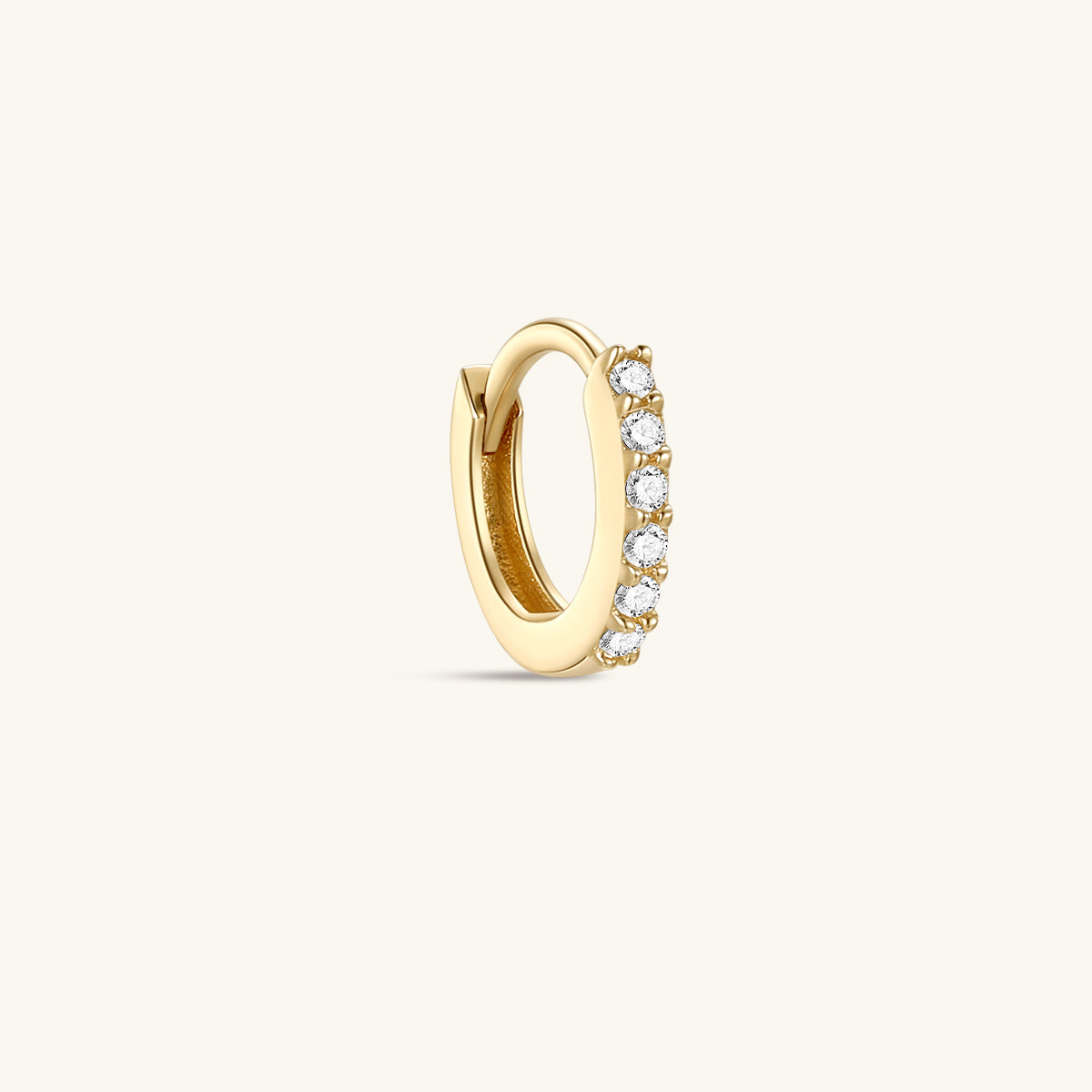 Single KOSINER minimalist pavé diamond clicker hoop in 14K solid yellow gold, seamless hinged closure, continuous row of sparkling faceted stones, clean minimalist product shot