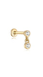 14K solid gold flat back labret stud with two bezel-set cubic zirconia stones, one fixed and one dangling.