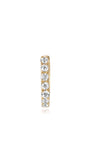 14K solid gold hoop earring with seven channel-set cubic zirconia stones, showcasing a polished shiny finish.