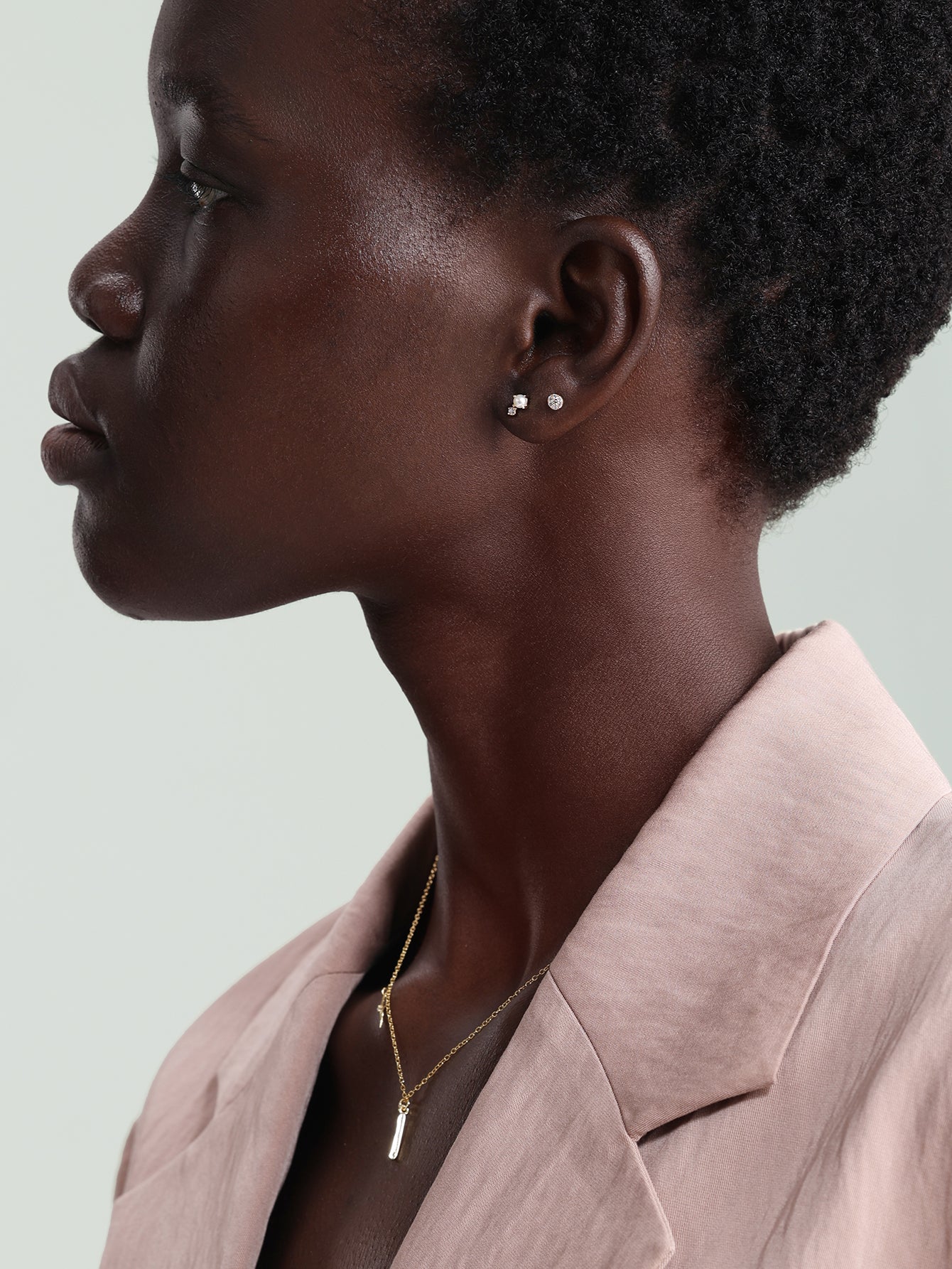 Kolczyki do przekłuwania uszu z 14-karatowego złota z perłą i cyrkonią