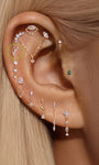 A refined 14K solid gold geometric climber stud