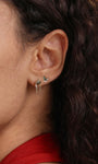 KOSINER elegant silver earrings featuring intricate floral designs, perfect for adding a touch of sophistication to any outfit.